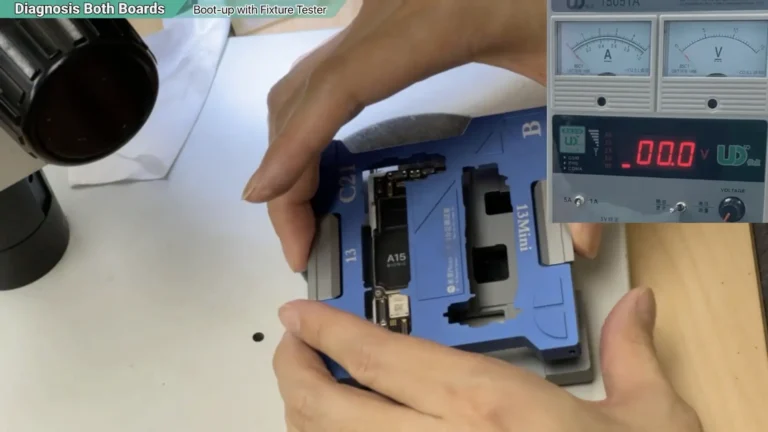 Assembling the sandwich board fixture to test both layers of the iPhone 13 motherboard without permanent soldering.