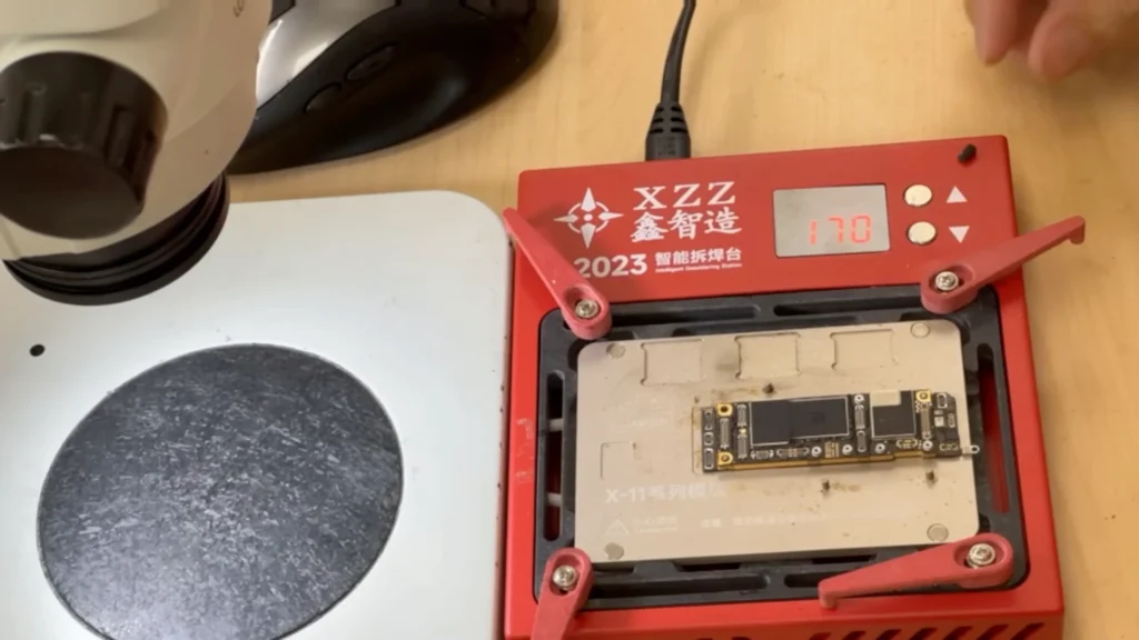 iPhone 11 sandwich logic board separated using a preheater for further diagnosis
