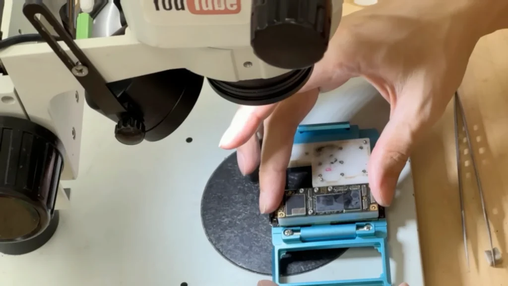 iPhone 11 upper CPU board installed onto the sandwich board tester