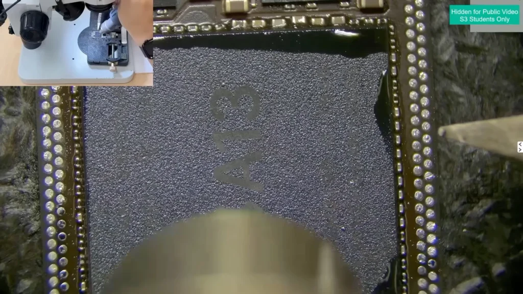 Removing the original Apple A13 CPU from an iPhone 11 logic board