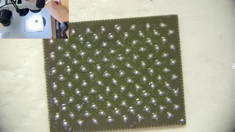 Original iPhone 11 NAND flash cleaned and reballed under microscope