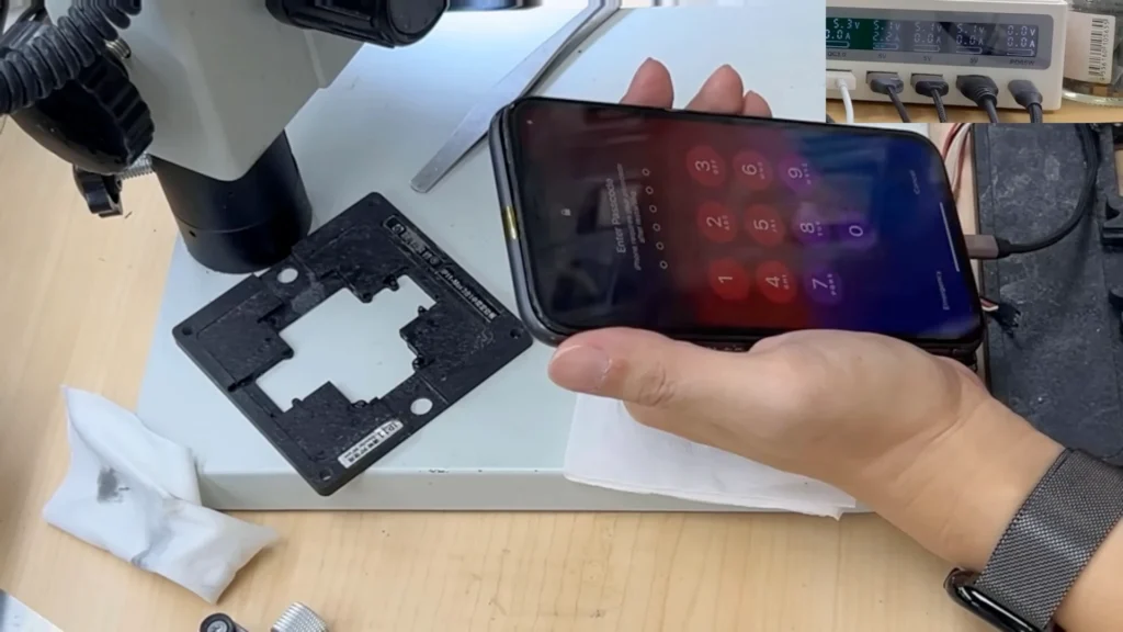 Completed iPhone 11 CPU repair with device powered on and original data preserved