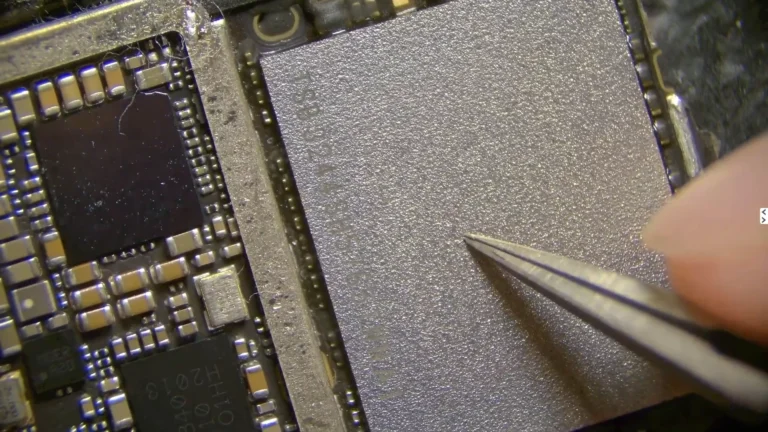 Microscope inspection of the original iPhone NAND flash memory during data recovery diagnosis
