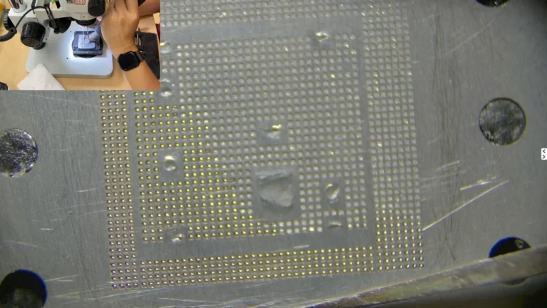 Hot air forming new solder balls through a stencil on the original iPhone CPU