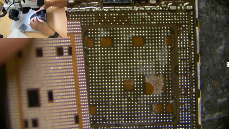 Original iPhone CPU being positioned onto the compatible donor motherboard