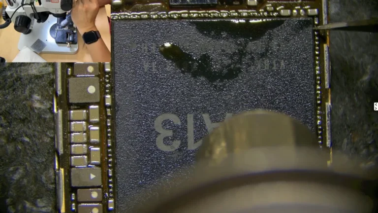 Original iPhone CPU being installed onto the donor motherboard using controlled hot air