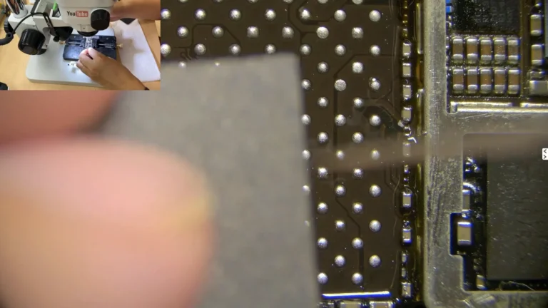 Reballed original iPhone NAND positioned for installation onto the donor motherboard